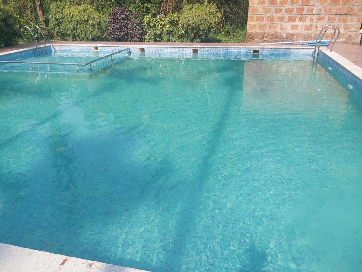 Ezzenza Areca Resort Madikeri Esterno foto